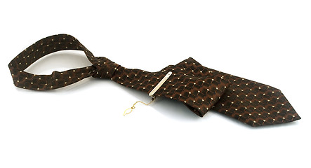 Image showing Tie with a gold pin