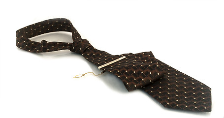 Image showing Tie with a gold pin