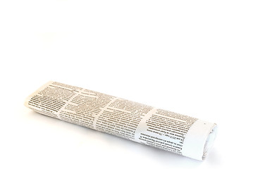 Image showing rolled up newspaper