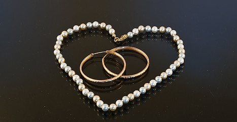Image showing Beads in the shape of a heart with two rings