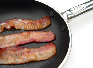 Image showing bacon in a frying pan