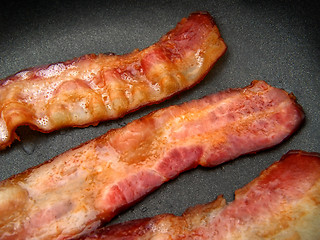 Image showing bacon frying