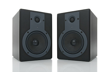 Image showing Pair of loud speakers with reflection