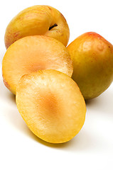 Image showing yellow green sweetie and red pluot fruits