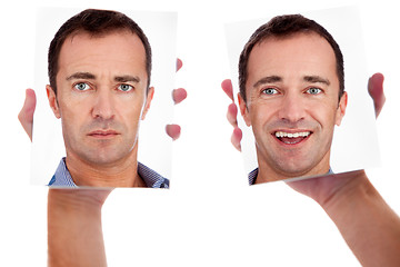Image showing One man, with two faces on the mirror