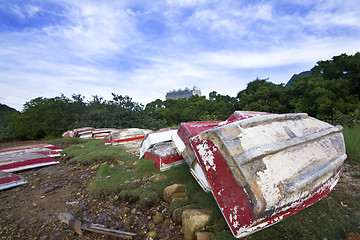 Image showing Old fish-boat on sandy beach.