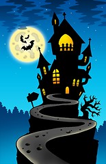 Image showing Haunted house on hill with Moon