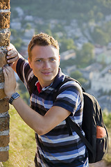 Image showing Smiling tourist