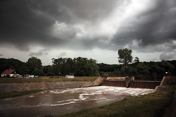 Image showing Storm over water dam