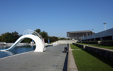 Image showing dispeopled bath pool with white slide