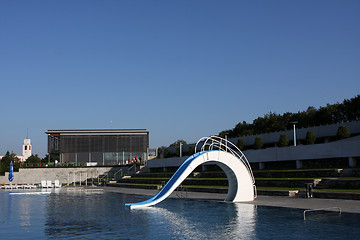 Image showing dispeopled bath pool with white slide