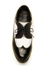 Image showing Two-tone black and white patent leather men's shoe