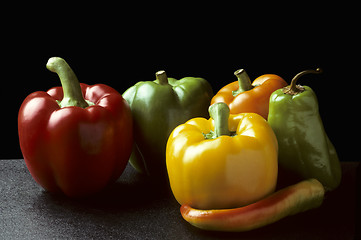 Image showing Bell and Chili peppers against black