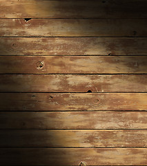 Image showing Distressed wooden surface lit diagonally