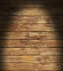 Image showing Distressed wooden surface lit dramatically