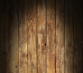 Image showing Distressed wooden surface lit dramatically