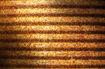 Image showing Rusty corrugated metal can surface lit diagonally