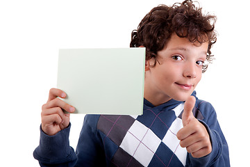 Image showing cute boy with a paperboard in hand