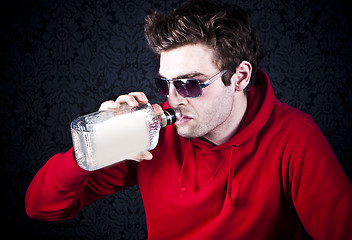 Image showing young man drinking and feeling despair