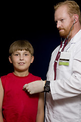 Image showing Doctor checking patient