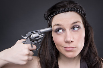 Image showing Gun At Womans Head
