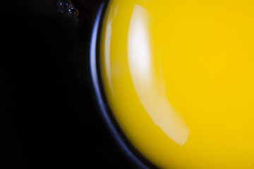 Image showing Raw egg in frying pan