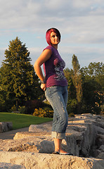 Image showing Girl standing on lakeshore.