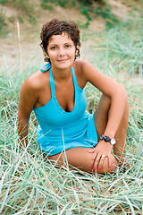 Image showing attractive brunet woman in blue