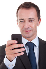 Image showing businessman looking to  the phone