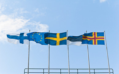 Image showing Fluttering Scandinavian flags against the sky