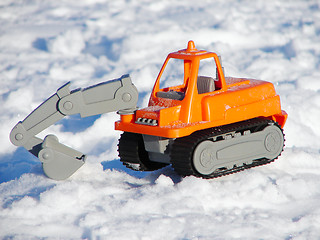 Image showing Toy excavator in the snow