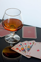 Image showing brandy and cards