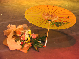 Image showing Flowers and Chinese umbrella