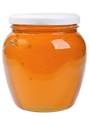 Image showing The only closed glass jar with honey