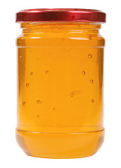 Image showing The only closed glass jar with honey