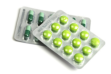 Image showing Green pills and capsules 