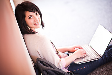 Image showing Mixed race college student with laptop