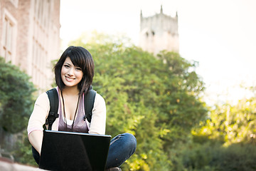 Image showing Mixed race college student with laptop