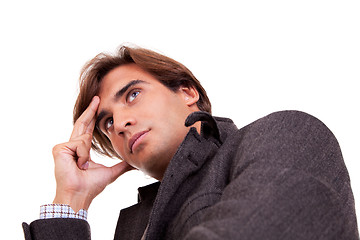 Image showing Portrait of a young businessman thinking