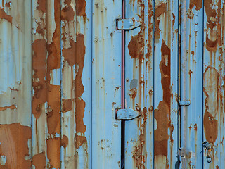 Image showing Rusty Blue Door Hinges