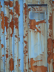 Image showing Rusty Blue Door with Vent