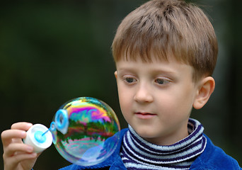 Image showing The boy and the bubble