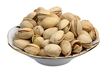 Image showing Pistachios on a plate, isolated