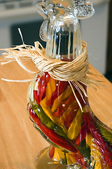 Image showing Decorative Glass Hen filled with Garlic and Peppers