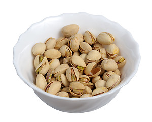 Image showing Pistachios on a plate, isolated