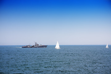 Image showing Battleship and sailboats