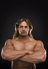 Image showing Sexy muscular man isolated on black