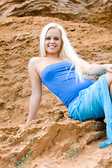 Image showing blond woman in blue 