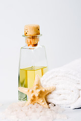 Image showing sea salt, towel, oil and stars