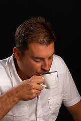 Image showing Drinking coffee